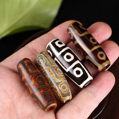 Techniek Gepolijste natuurlijke losse edelsteen Tibetaanse 9Oog Dzi Perlen 40mm Agate Barrel Perlen voor sieraden