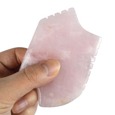 2024 Rozenkwarts Gua Sha massagetool met tanden Natuurlijke kristallen huid Schoonheid massager Gezichtslifting Anti-aging Roze logo