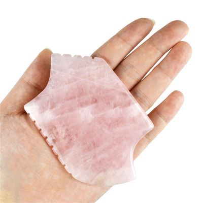 2024 Rozenkwarts Gua Sha massagetool met tanden Natuurlijke kristallen huid Schoonheid massager Gezichtslifting Anti-aging Roze logo