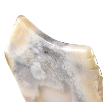 Lichaamsmassageapparatuur Eigenschappen Wit natuurlijke Guasha gezichtsmiddelen voor gezichtsspa met Sakura Agate Jade Gua Sha gezichtsmiddel