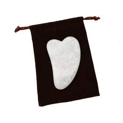 Handgereedschap Gua Sha gemaakt van witte jade voor effectieve spiermassage en schoonheidsverzorging