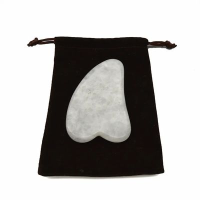 Handgereedschap Gua Sha gemaakt van witte jade voor effectieve spiermassage en schoonheidsverzorging