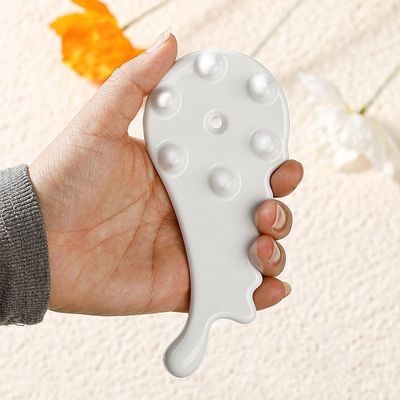 Ervaar de helende kracht van keramische Gua Sha kam voor gezichts- en lichaamsmassage