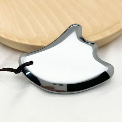 Gezichtsmassageapparaat vleugelvorm Terahertz schraapplaat lichaamsmassageapparatuur voor facelift massagebord