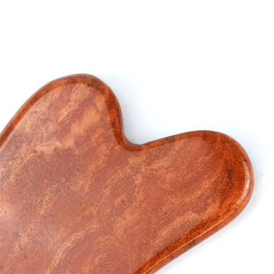 Lichaamsmassage Natural Heart Shape Red Jasper Gua Sha Scraping Board voor gezichtsverzorging