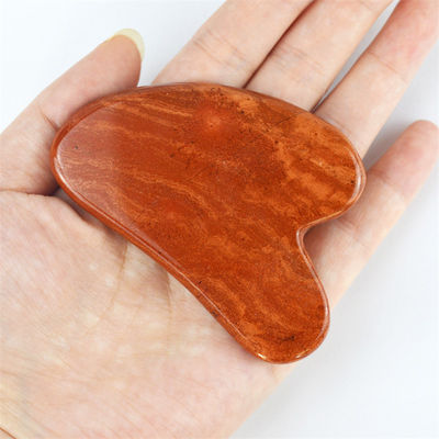 Lichaamsmassage Natural Heart Shape Red Jasper Gua Sha Scraping Board voor gezichtsverzorging