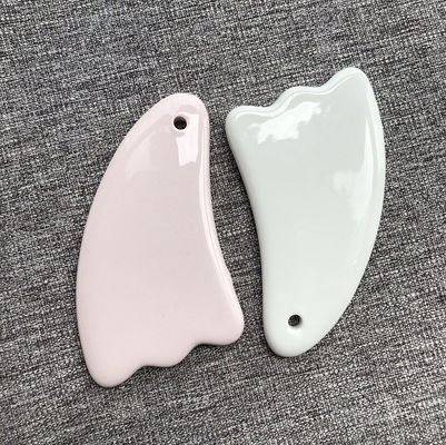 2024 Design Multi Function Unieke Keramiek Guasha Schrapen Gezichtslichaam Gua Sha Massager voor gezicht en lichaam verjonging