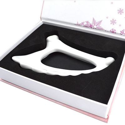 Massasjehulpmiddelen 2024 Wing Shape Ceramic Gua Sha Handheld Massager voor Body Massager Lymfatische drainage en anti-aging tool