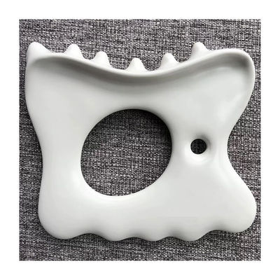Verlicht spierspanning en pijn met aangepaste logo keramische Gua Sha Tool kaaklijn massage