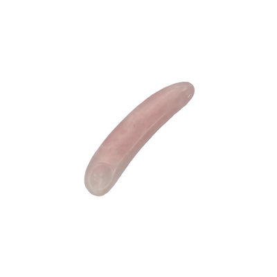 Verminder zwelling met gebogen cosmetische spatula en Mini Rose Quartz oogcrème applicator op gezicht Gua Sha massage stick