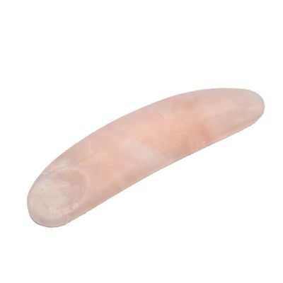 Verminder zwelling met gebogen cosmetische spatula en Mini Rose Quartz oogcrème applicator op gezicht Gua Sha massage stick