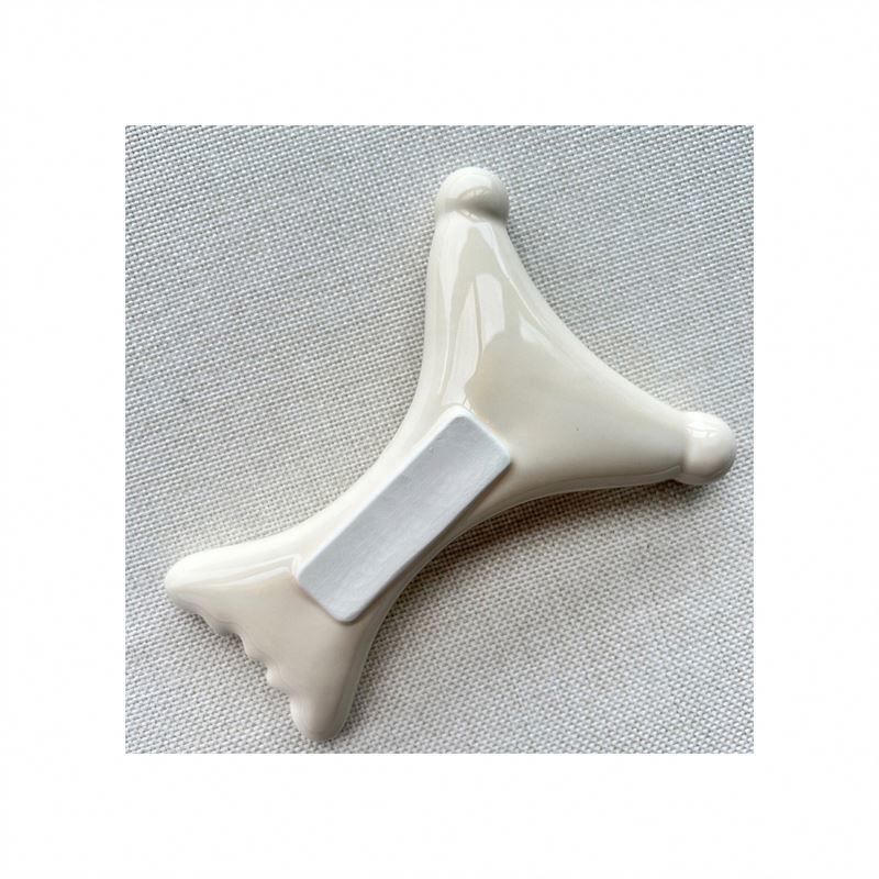 OEM/ODM X-vormige keramische Gua Sha Schrapen Massageur Schoonheidssalon Essentieel voor gezichtsrelaxatie