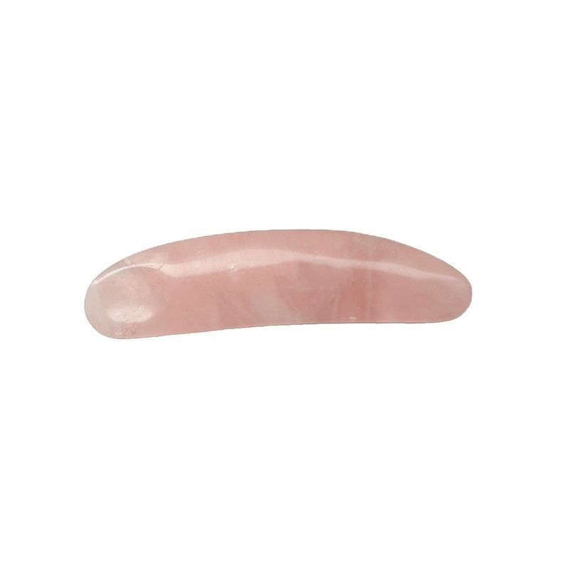 Verminder zwelling met gebogen cosmetische spatula en Mini Rose Quartz oogcrème applicator op gezicht Gua Sha massage stick
